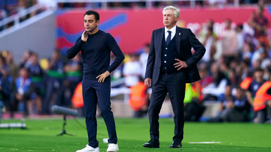 Xavi Hernandez and Carlo Ancelotti