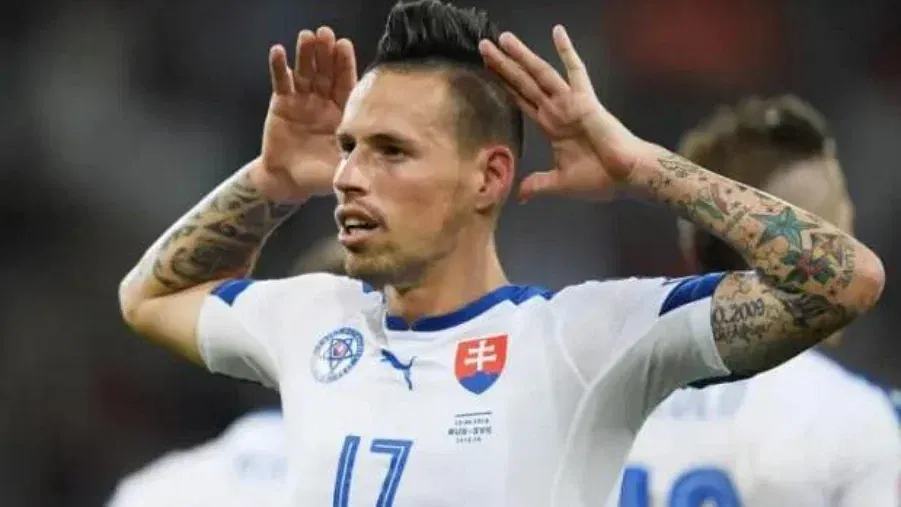 Marek Hamšík at Euro 2024, guiding Slovakia from the sidelines, inspiring team success.